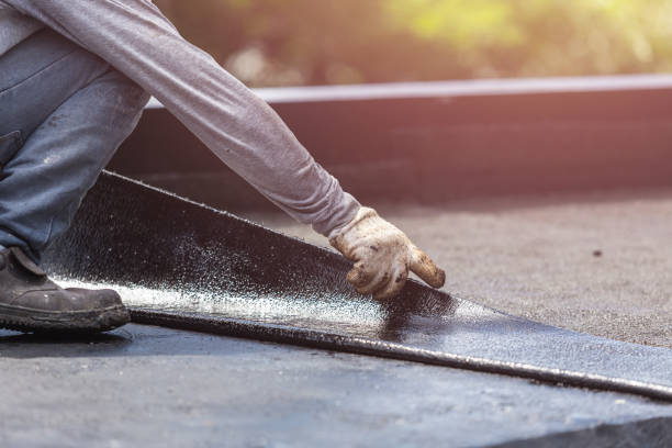 Professional Basement Waterproofing technician working in Custar, OH
